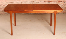 Load image into Gallery viewer, Mid Century extending teak dining table by McIntosh, circa 1960s
