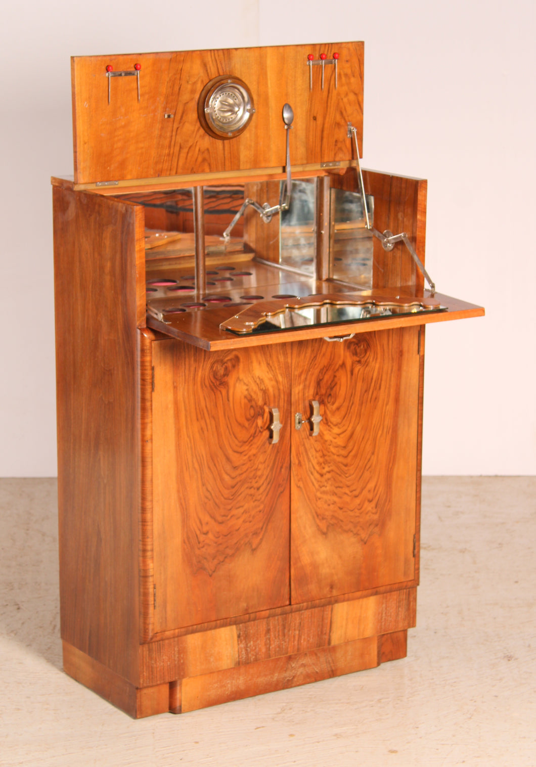 Art Deco walnut cocktail cabinet, circa 1930s.