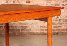 Load image into Gallery viewer, Mid Century extending teak dining table by White&amp;Newton, circa 1970s
