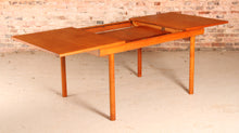Load image into Gallery viewer, Mid Century extending teak dining table by White&amp;Newton, circa 1970s
