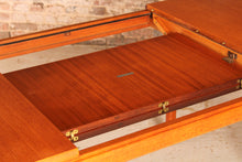 Load image into Gallery viewer, Mid Century extending teak dining table by White&amp;Newton, circa 1970s
