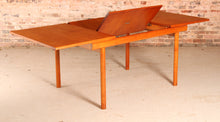 Load image into Gallery viewer, Mid Century extending teak dining table by White&amp;Newton, circa 1970s
