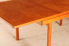 Load image into Gallery viewer, Mid Century extending teak dining table by White&amp;Newton, circa 1970s
