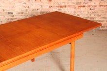 Load image into Gallery viewer, Mid Century extending teak dining table by White&amp;Newton, circa 1970s
