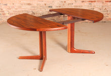 Load image into Gallery viewer, Danish Mid Century extending round/oval rosewood dining table, circa 1970s.
