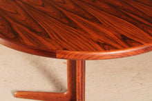 Load image into Gallery viewer, Danish Mid Century extending round/oval rosewood dining table, circa 1970s.
