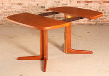 Load image into Gallery viewer, Danish Mid Century extending teak dining table by Skovby, circa 1970s
