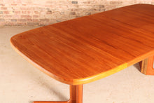 Load image into Gallery viewer, Danish Mid Century extending teak dining table by Skovby, circa 1970s
