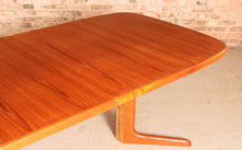 Load image into Gallery viewer, Danish Mid Century extending teak dining table by Skovby, circa 1970s
