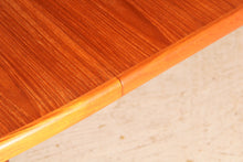 Load image into Gallery viewer, Danish Mid Century extending teak dining table by Skovby, circa 1970s
