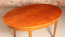 Load image into Gallery viewer, Mid Century extending teak dining table by Greaves&amp;Thomas, circa 1960s.
