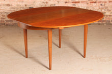 Load image into Gallery viewer, Mid Century extending teak dining table by Greaves&amp;Thomas, circa 1960s.
