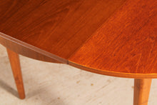 Load image into Gallery viewer, Mid Century extending teak dining table by Greaves&amp;Thomas, circa 1960s.
