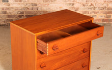 Load image into Gallery viewer, Mid Century teak chest of 4 drawers by Stag, circa 1970s.
