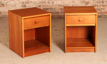 Load image into Gallery viewer, A pair of teak bedside tables by Stag, circa 1970s
