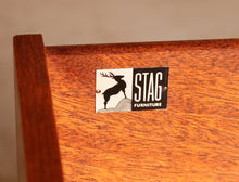 Load image into Gallery viewer, A pair of teak bedside tables by Stag, circa 1970s
