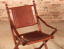 Load image into Gallery viewer, Contemporary campaign style teak, leather and brass folding chairs by Eichholtz
