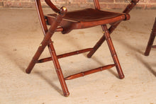 Load image into Gallery viewer, Contemporary campaign style teak, leather and brass folding chairs by Eichholtz
