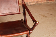 Load image into Gallery viewer, Contemporary campaign style teak, leather and brass folding chairs by Eichholtz
