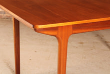 Load image into Gallery viewer, Mid Century extending teak dining table by Mcintosh, circa 1960s.
