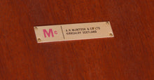 Load image into Gallery viewer, Mid Century extending teak dining table by Mcintosh, circa 1960s.
