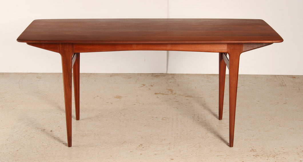 A Mid Century solid afrormosia dining table by A. Younger Ltd, circa 1960s