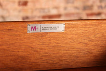 Load image into Gallery viewer, Mid Century teak chest of 4 drawers with teak and brass handles by McIntosh, circa 1970s.
