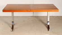 Load image into Gallery viewer, Danish Mid Century extending teak dining table with chrome legs by Poul Norrelikt for Dyrlund, circa 1970s
