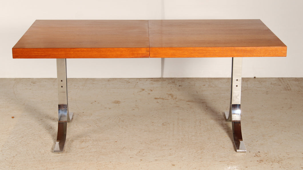 Danish Mid Century extending teak dining table with chrome legs by Poul Norrelikt for Dyrlund, circa 1970s