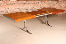 Load image into Gallery viewer, Danish Mid Century extending teak dining table with chrome legs by Poul Norrelikt for Dyrlund, circa 1970s

