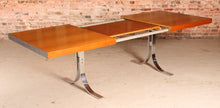 Load image into Gallery viewer, Danish Mid Century extending teak dining table with chrome legs by Poul Norrelikt for Dyrlund, circa 1970s
