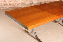 Load image into Gallery viewer, Danish Mid Century extending teak dining table with chrome legs by Poul Norrelikt for Dyrlund, circa 1970s
