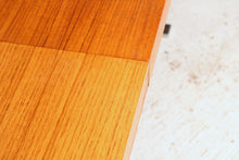 Load image into Gallery viewer, Danish Mid Century extending teak dining table with chrome legs by Poul Norrelikt for Dyrlund, circa 1970s
