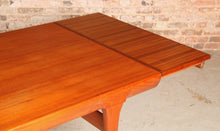 Load image into Gallery viewer, Danish Mid Century teak dining table by Ib Kofod Larsen for Faarup Mobelfabrik, circa 1960
