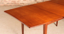Load image into Gallery viewer, Mid Century extending afromosia dining table by Richard Hornby, circa 1960s
