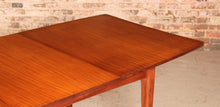 Load image into Gallery viewer, Mid Century extending afromosia dining table by Richard Hornby, circa 1960s
