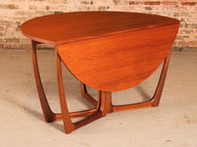 Load image into Gallery viewer, Mid Century drop leaf / gateleg teak dining table by Beithcraft, Scotland, circa 1960s.
