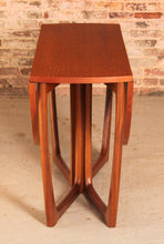 Load image into Gallery viewer, Mid Century drop leaf / gateleg teak dining table by Beithcraft, Scotland, circa 1960s.

