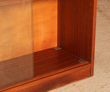 Load image into Gallery viewer, Mid Century teak and mahogany glass fronted bookcase, circa 1960s
