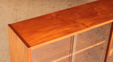 Load image into Gallery viewer, Mid Century teak and mahogany glass fronted bookcase, circa 1960s
