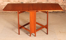 Load image into Gallery viewer, Mid Century McIntosh drop leaf dining table, circa 1970s

