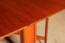 Load image into Gallery viewer, Mid Century McIntosh drop leaf dining table, circa 1970s
