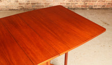 Load image into Gallery viewer, Mid Century McIntosh drop leaf dining table, circa 1970s
