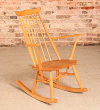 Load image into Gallery viewer, Mid Century Ercol elm and beech rocking chair with blue label, circa 1960s.
