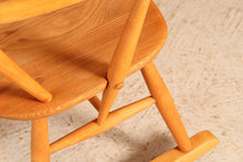 Load image into Gallery viewer, Mid Century Ercol elm and beech rocking chair with blue label, circa 1960s.
