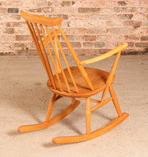 Load image into Gallery viewer, Mid Century Ercol elm and beech rocking chair with blue label, circa 1960s.
