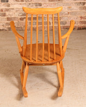 Load image into Gallery viewer, Mid Century Ercol elm and beech rocking chair with blue label, circa 1960s.
