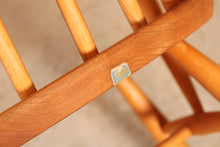 Load image into Gallery viewer, Mid Century Ercol elm and beech rocking chair with blue label, circa 1960s.
