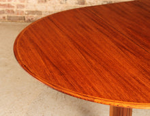 Load image into Gallery viewer, Danish Mid Century extending rosewood dining table by Dyrlund, circa 1970s
