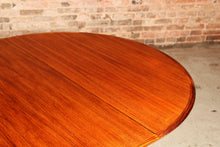 Load image into Gallery viewer, Danish Mid Century extending rosewood dining table by Dyrlund, circa 1970s
